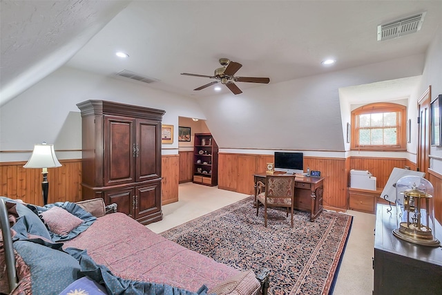 5318 Westerham St, Fulshear, TX 77441 - office area with wainscoting, wooden walls, vaulted ceiling, a ceiling fan, and light carpet