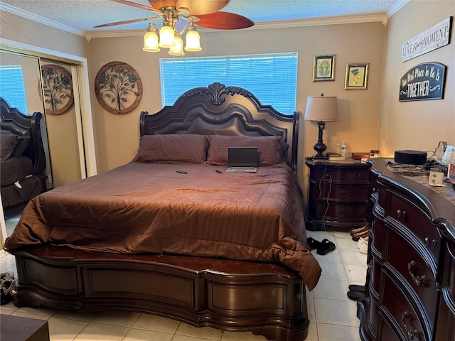 2120 El Paseo St Unit 209, Houston, TX 77054 - bedroom featuring light tile patterned floors, ornamental molding, a textured ceiling, multiple windows, and ceiling fan