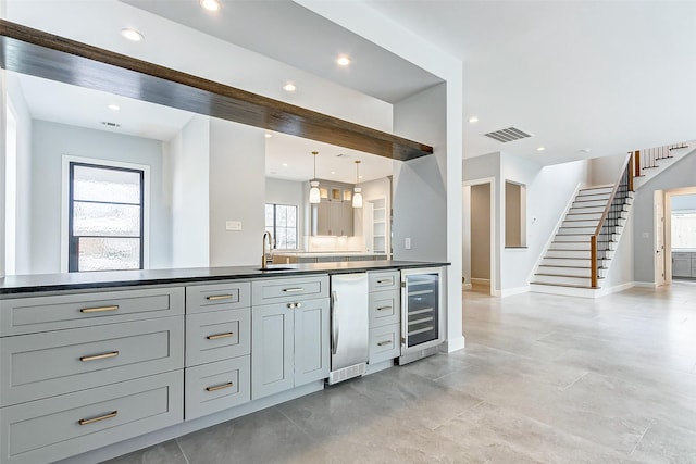 6522 Westview Dr, Houston, TX 77055 - full bath with beverage cooler, vanity, baseboards, and recessed lighting