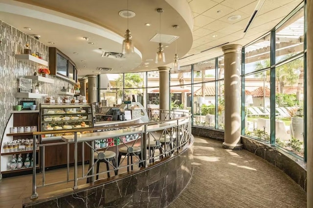 5220 Seawall Blvd Unit 1035, Galveston, TX 77551 - bar area with ornate columns and carpet