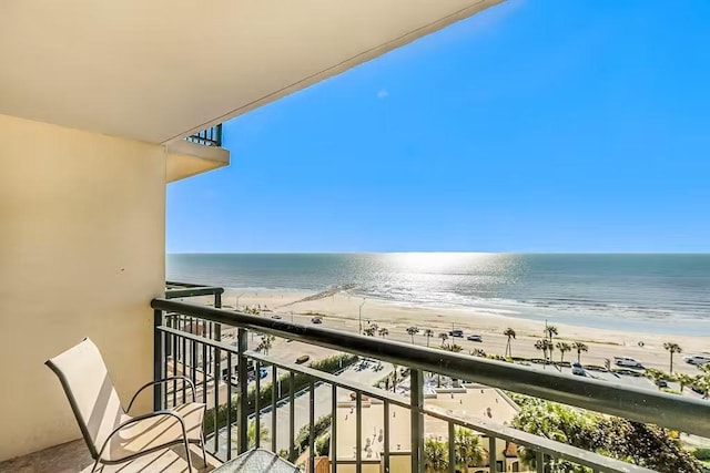 5220 Seawall Blvd Unit 1035, Galveston, TX 77551 - balcony featuring view of water and beach