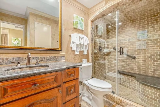 5220 Seawall Blvd Unit 1035, Galveston, TX 77551 - full bathroom with vanity, crown molding, toilet, and a shower stall