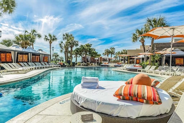 5220 Seawall Blvd Unit 1035, Galveston, TX 77551 - community pool featuring a patio