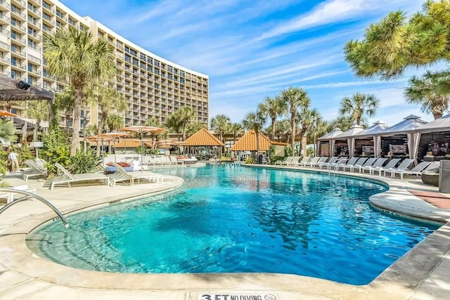 5220 Seawall Blvd Unit 1035, Galveston, TX 77551 - community pool featuring a gazebo and a patio