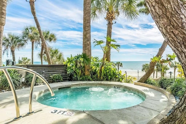 5220 Seawall Blvd Unit 1035, Galveston, TX 77551 - view of pool with a water view