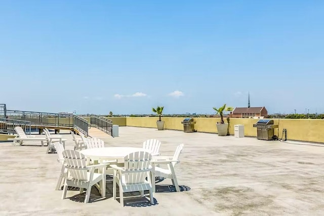 5220 Seawall Blvd Unit 1035, Galveston, TX 77551 - view of patio featuring area for grilling
