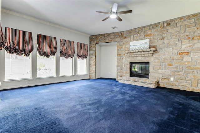 22110 Stone Cross Ct, Katy, TX 77450 - unfurnished living room with carpet flooring, a ceiling fan, ornamental molding, and a fireplace