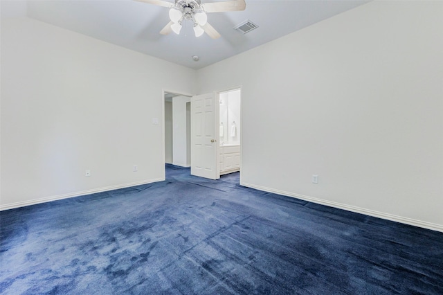 22110 Stone Cross Ct, Katy, TX 77450 - empty room featuring baseboards, ceiling fan, and dark carpet