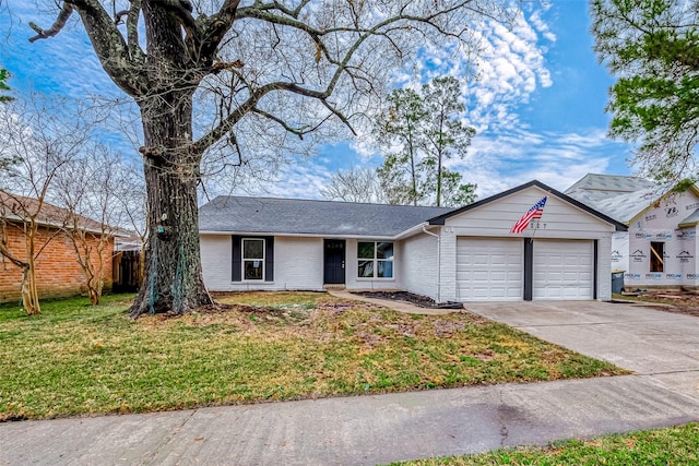 23227 Pine Post Ln, Spring, TX 77373 - ranch-style home with an attached garage, driveway, brick siding, and a shingled roof
