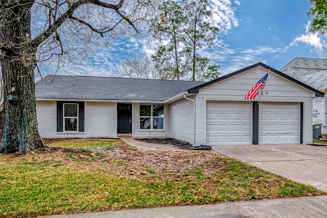 23227 Pine Post Ln, Spring, TX 77373 - ranch-style house featuring a garage, concrete driveway, brick siding, and a shingled roof