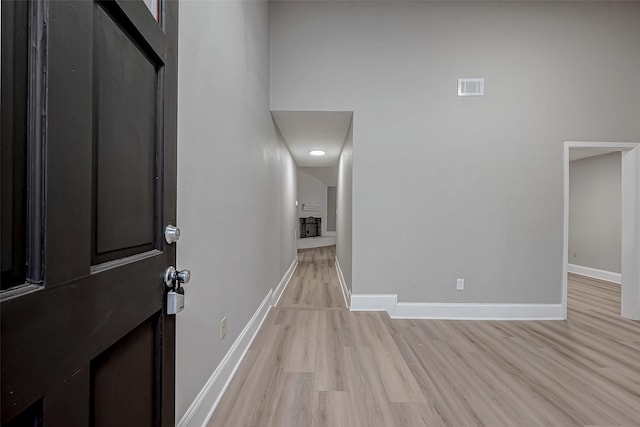 23227 Pine Post Ln, Spring, TX 77373 - foyer entrance with light wood-type flooring and baseboards