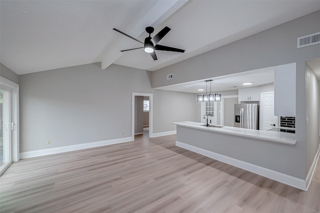 23227 Pine Post Ln, Spring, TX 77373 - unfurnished living room with a sink, light wood-style flooring, baseboards, and a ceiling fan