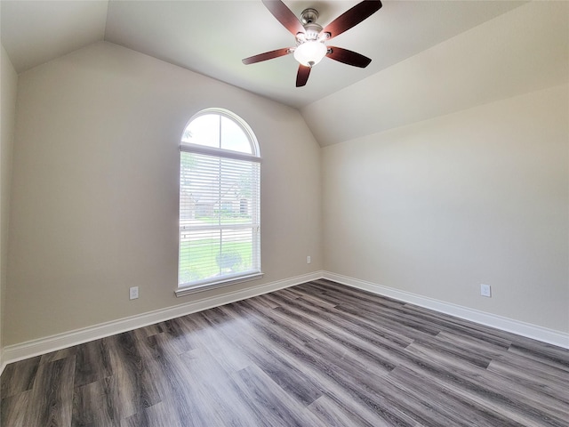 1314 Watercrest Park Ln, Rosenberg, TX 77471 - unfurnished room with lofted ceiling, a ceiling fan, dark wood finished floors, and baseboards