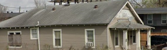 2007 Massie St, Houston, TX 77026 - view of side of home with a shingled roof and cooling unit