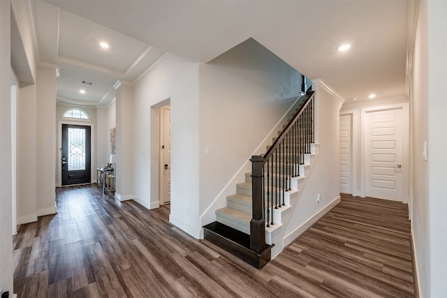 4423 Sterling Heights Ln, Sugar Land, TX 77479 - foyer entrance with ornamental molding, wood finished floors, stairs, baseboards, and recessed lighting