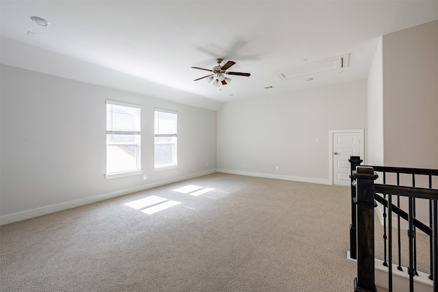 4423 Sterling Heights Ln, Sugar Land, TX 77479 - empty room with light carpet, a ceiling fan, baseboards, and attic access
