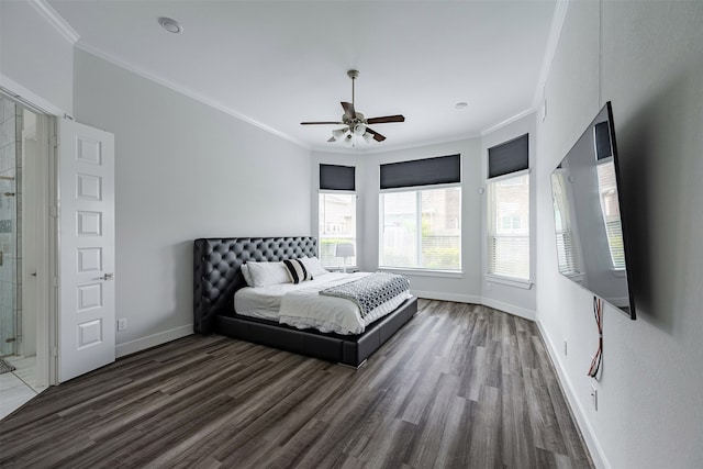 4423 Sterling Heights Ln, Sugar Land, TX 77479 - bedroom with crown molding, wood finished floors, baseboards, and a ceiling fan