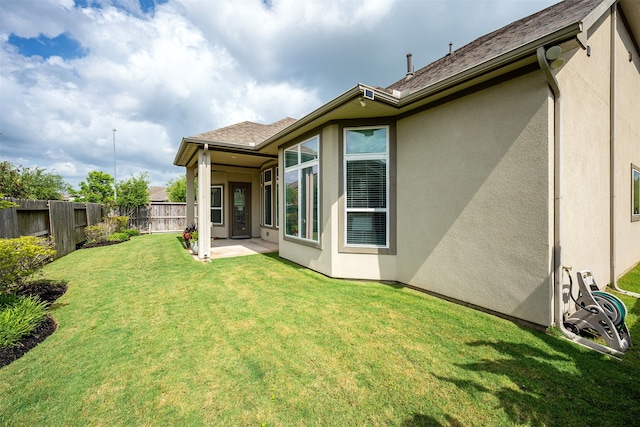 4423 Sterling Heights Ln, Sugar Land, TX 77479 - back of house featuring stucco siding and a patio area