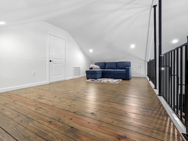 1025 Sunset Cir W, Crystal Beach, TX 77650 - additional living space featuring lofted ceiling and hardwood / wood-style flooring