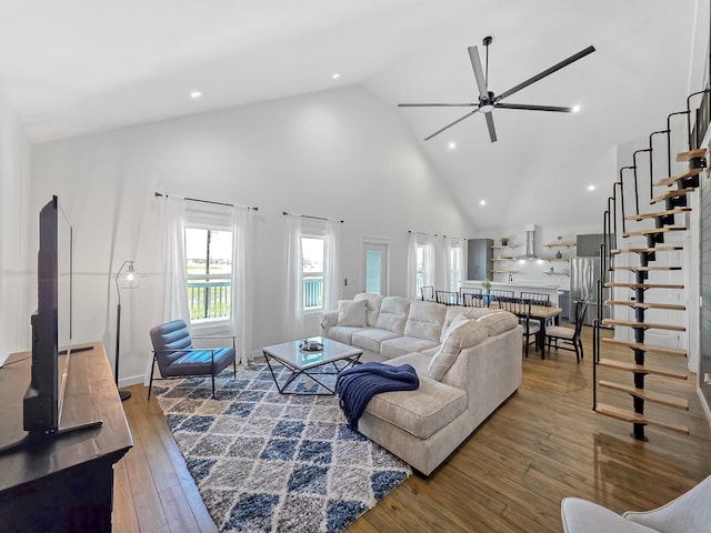 1025 Sunset Cir W, Crystal Beach, TX 77650 - living room with a ceiling fan, high vaulted ceiling, wood-type flooring, and recessed lighting
