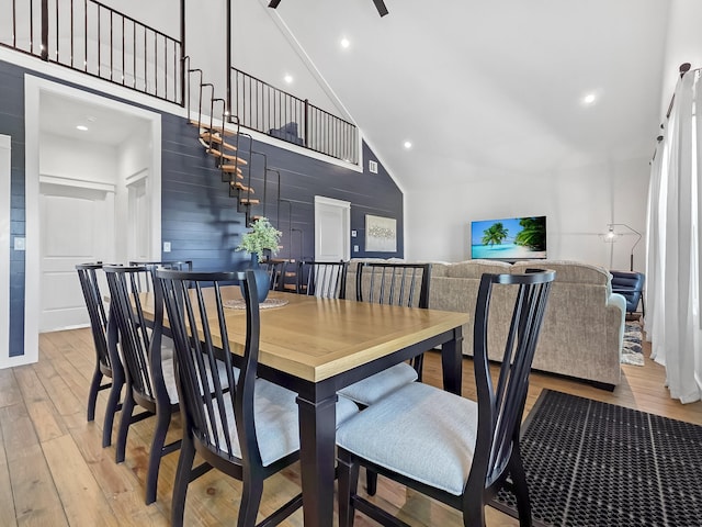 1025 Sunset Cir W, Crystal Beach, TX 77650 - dining area with high vaulted ceiling, wood-type flooring, and recessed lighting