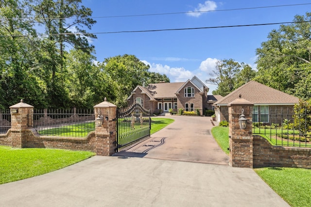 1917 Anchor Way, Dickinson, TX 77539 - view of front of property featuring driveway and a gate