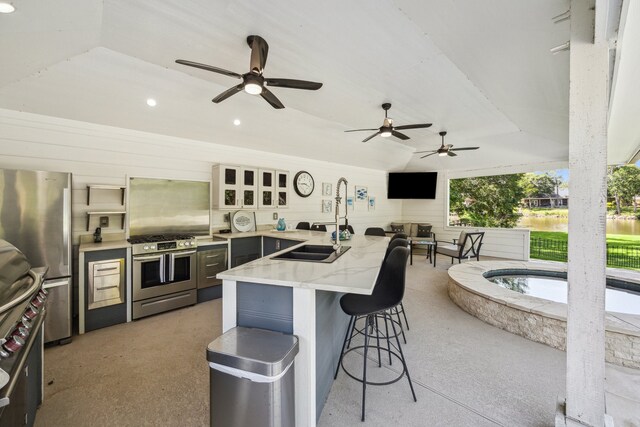 1917 Anchor Way, Dickinson, TX 77539 - view of patio / terrace featuring exterior kitchen, a sink, and ceiling fan