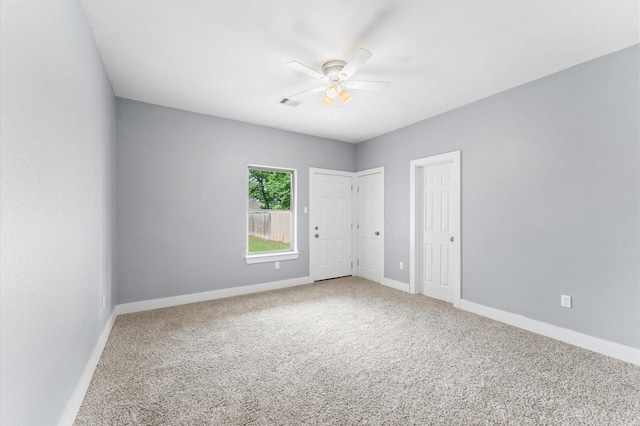 4534 Maggie St, Houston, TX 77051 - spare room featuring a ceiling fan, carpet, and baseboards