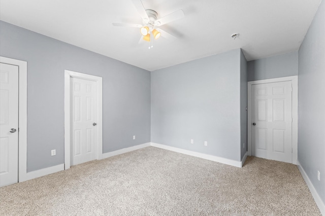 4534 Maggie St, Houston, TX 77051 - unfurnished bedroom with carpet, baseboards, and ceiling fan