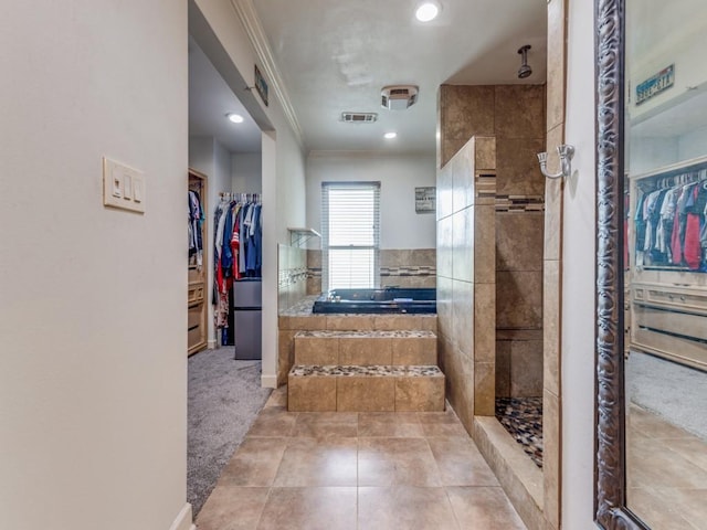 674 Ravensworth Dr, Conroe, TX 77302 - full bath featuring a garden tub, ornamental molding, a walk in closet, a tile shower, and recessed lighting