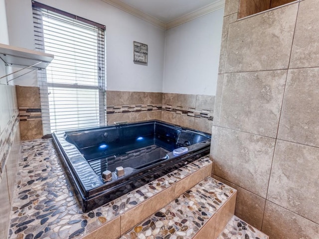 674 Ravensworth Dr, Conroe, TX 77302 - bathroom featuring a whirlpool tub, crown molding, and tile walls