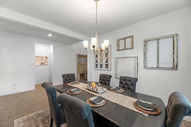 15010 Lake Shore Ave, Mont Belvieu, TX 77523 - dining space with a chandelier, wood finished floors, baseboards, and recessed lighting