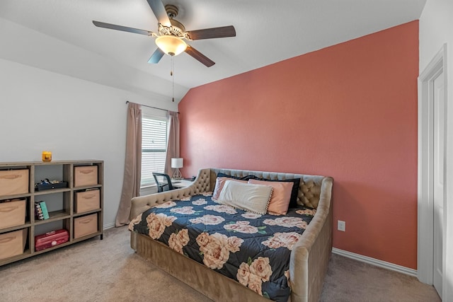 15010 Lake Shore Ave, Mont Belvieu, TX 77523 - bedroom featuring light carpet, vaulted ceiling, a ceiling fan, and baseboards
