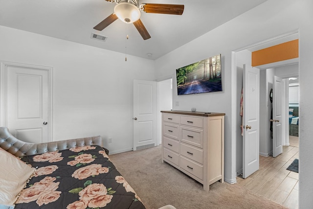 15010 Lake Shore Ave, Mont Belvieu, TX 77523 - bedroom with baseboards, ceiling fan, and light colored carpet