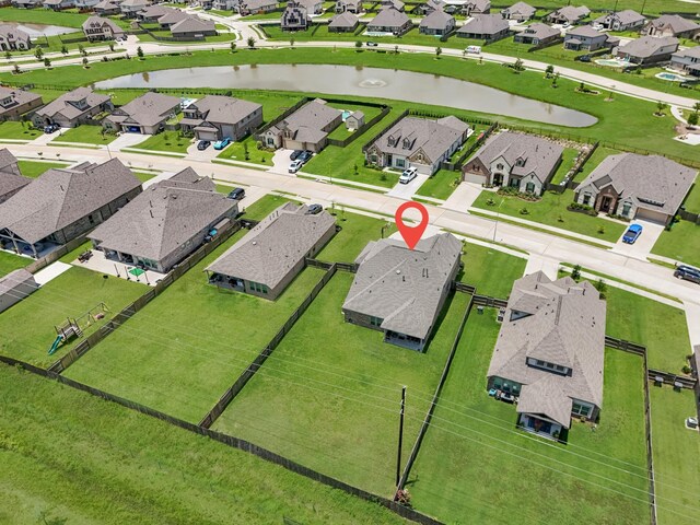 15010 Lake Shore Ave, Mont Belvieu, TX 77523 - aerial perspective of suburban area featuring a large body of water
