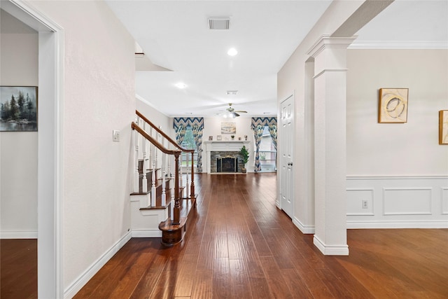 1711 Alcorn Bayou Dr, Sugar Land, TX 77479 - entryway featuring ceiling fan, ornate columns, a stone fireplace, stairs, and wood-type flooring