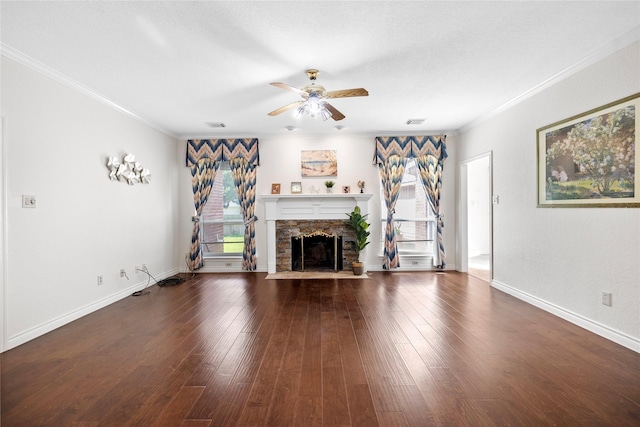 1711 Alcorn Bayou Dr, Sugar Land, TX 77479 - unfurnished living room featuring ceiling fan, a fireplace, ornamental molding, hardwood / wood-style flooring, and baseboards