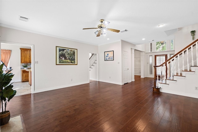 1711 Alcorn Bayou Dr, Sugar Land, TX 77479 - unfurnished living room featuring stairs, ceiling fan, hardwood / wood-style flooring, crown molding, and baseboards