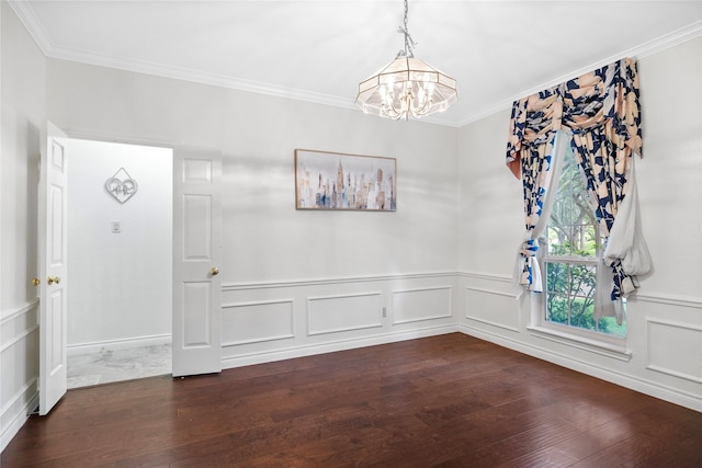 1711 Alcorn Bayou Dr, Sugar Land, TX 77479 - empty room featuring a chandelier, dark wood-style floors, crown molding, a decorative wall, and a wainscoted wall