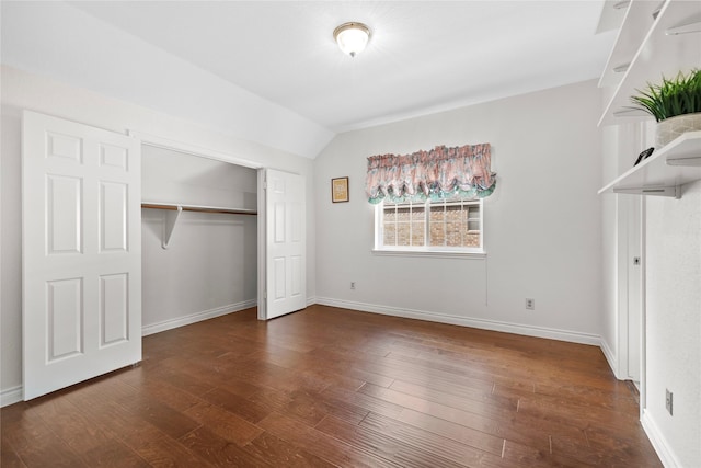 1711 Alcorn Bayou Dr, Sugar Land, TX 77479 - unfurnished bedroom featuring vaulted ceiling, wood finished floors, baseboards, and a closet
