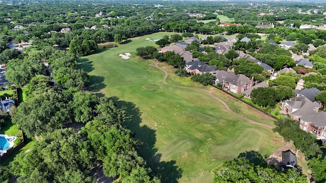 1711 Alcorn Bayou Dr, Sugar Land, TX 77479 - aerial overview of property's location with nearby suburban area, a golf course, and a tree filled landscape