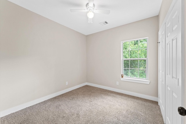 9303 Firnat St, Houston, TX 77016 - carpeted empty room featuring baseboards and ceiling fan