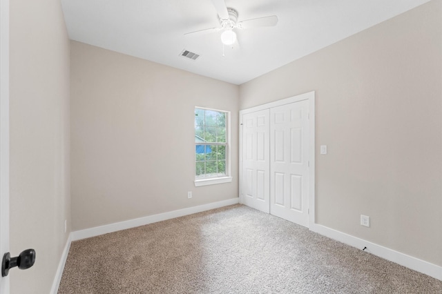 9303 Firnat St, Houston, TX 77016 - unfurnished bedroom featuring carpet floors, baseboards, a closet, and a ceiling fan