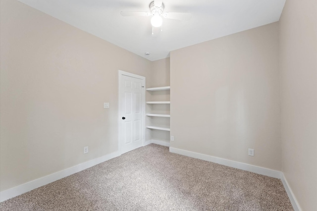 9303 Firnat St, Houston, TX 77016 - unfurnished room featuring light colored carpet, a ceiling fan, and baseboards