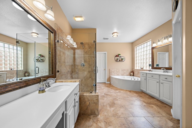 20306 Silverwood Trl, Cypress, TX 77433 - full bath with two vanities, a stall shower, a bath, and healthy amount of natural light