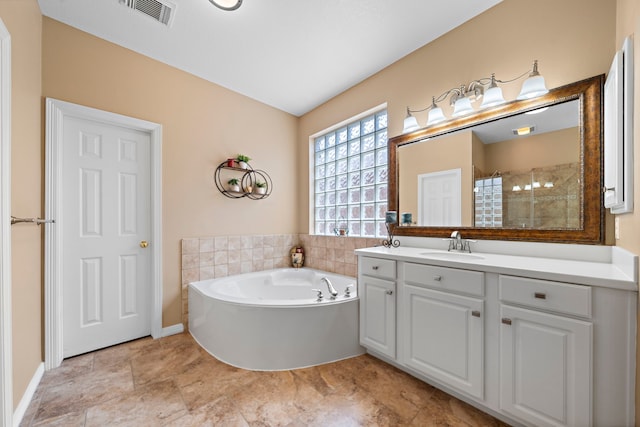 20306 Silverwood Trl, Cypress, TX 77433 - full bathroom featuring vanity, a bath, and tiled shower