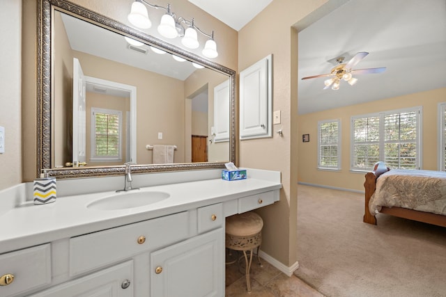 20306 Silverwood Trl, Cypress, TX 77433 - bathroom featuring plenty of natural light, vanity, ceiling fan, and baseboards