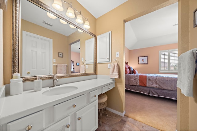 20306 Silverwood Trl, Cypress, TX 77433 - bathroom with connected bathroom, vanity, and baseboards