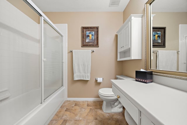 20306 Silverwood Trl, Cypress, TX 77433 - full bath with toilet, enclosed tub / shower combo, vanity, and baseboards
