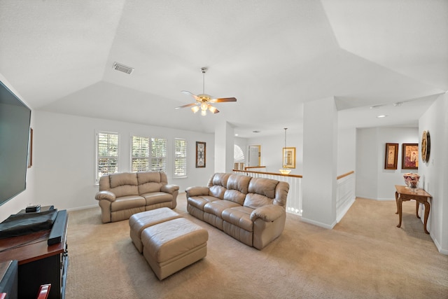 20306 Silverwood Trl, Cypress, TX 77433 - living room featuring light carpet, ceiling fan, lofted ceiling, and baseboards